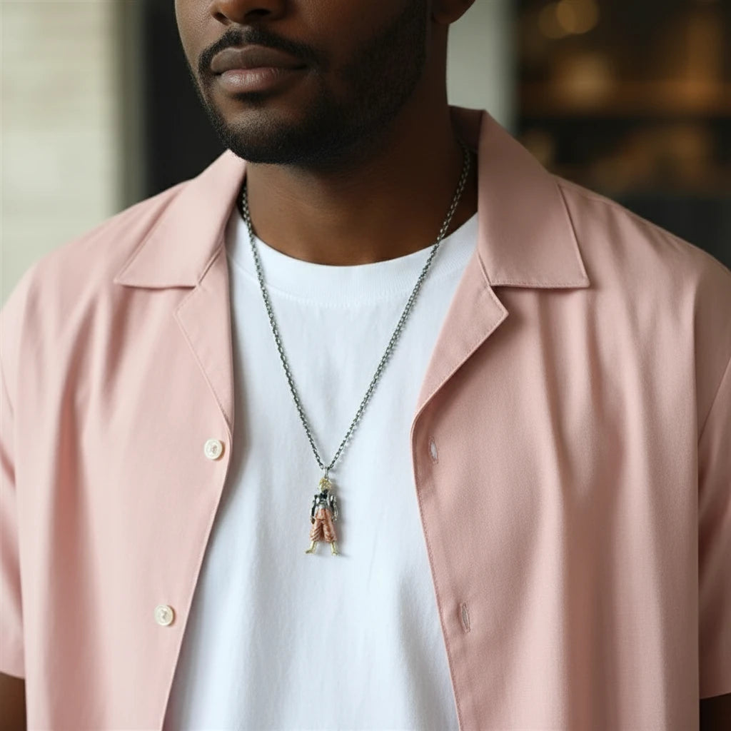 person wearing a goku super Saiyan necklace